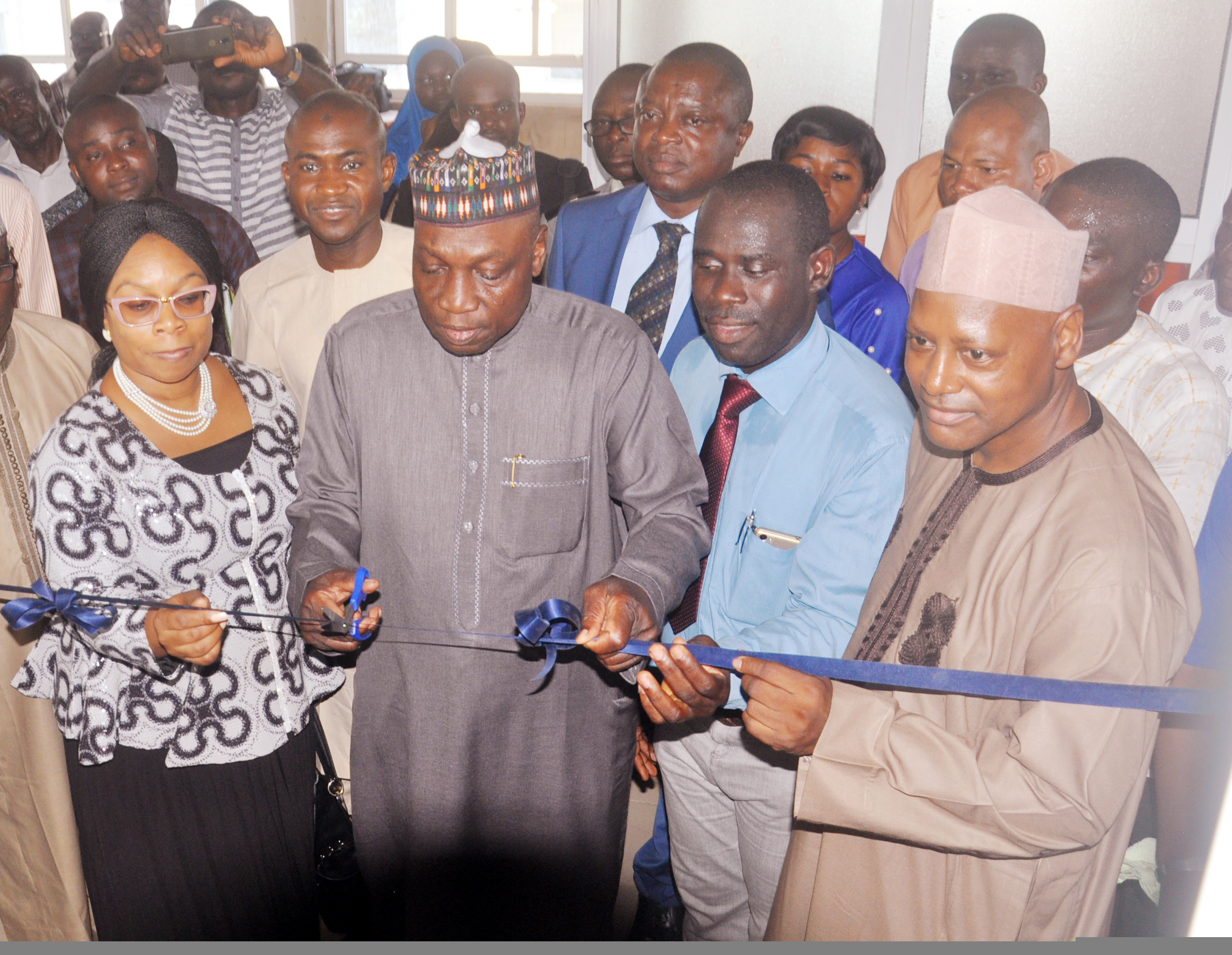 Managing Director, Federal Airport Authority of Nigeria, (FAAN), Engr. Saleh Dunoma, cutting the tape, others, from left, Director of Finance and Account, (FAA) Mrs. Nike Aboderin, Chairman, League of Airports and Aviation Correspondents, (LAAC) Mr. Olusegun Koiki and Director of Commercial and Business Development, (FAAN) Mr. Sadiku Rafindadi at the commissioning of LAAC press cetre, Murtatal Mohammed Airport, Ikeja, Lagos