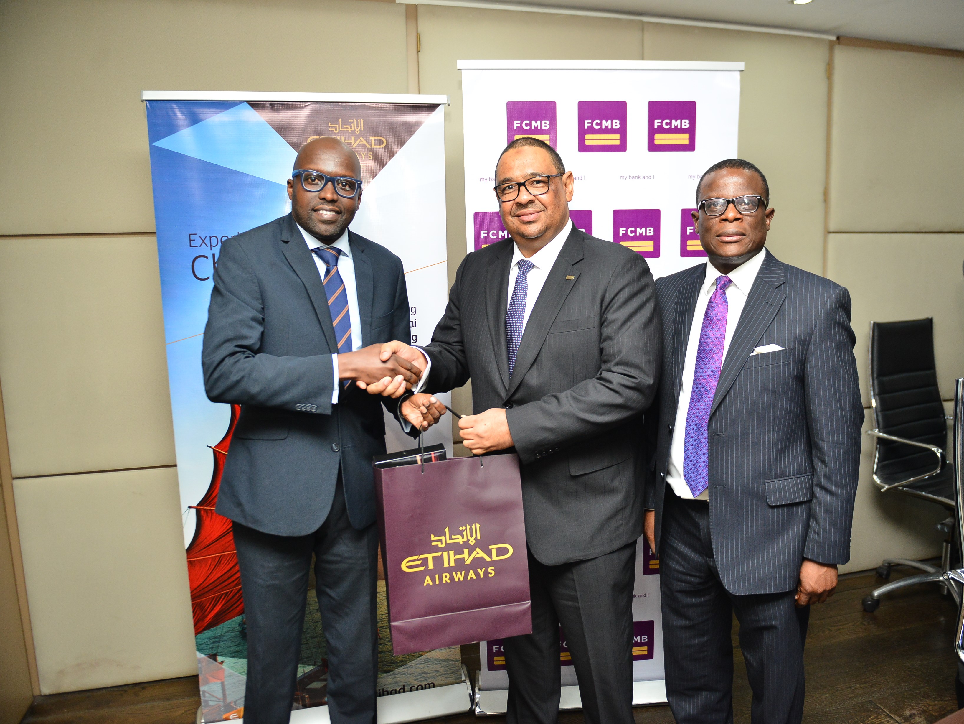 L-R General Manager, West and North Africa of Etihad Airways, Mr. George Mawadri, MD/CEO, FCMB, Mr. Adamu Nuru and the Executive Director, Retail Banking of FCMB, Mr. Olu Akanmu at the MOU signing in Lagos