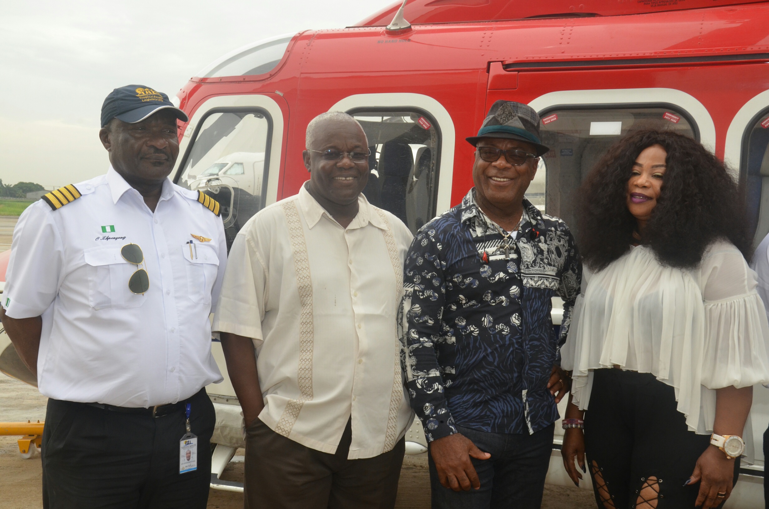 L-R: Captain Ofu Ekpenyong, General Manager, Tropical Arctic Logistics (TAL), Wale Adeniji, Chairman of TAL, Emperor Chris Baywood Ibe and his wife, Pat at the welcoming ceremony on the arrival of 12- seater helicopter at Muritala International Airport, Lagos on Tuesday.