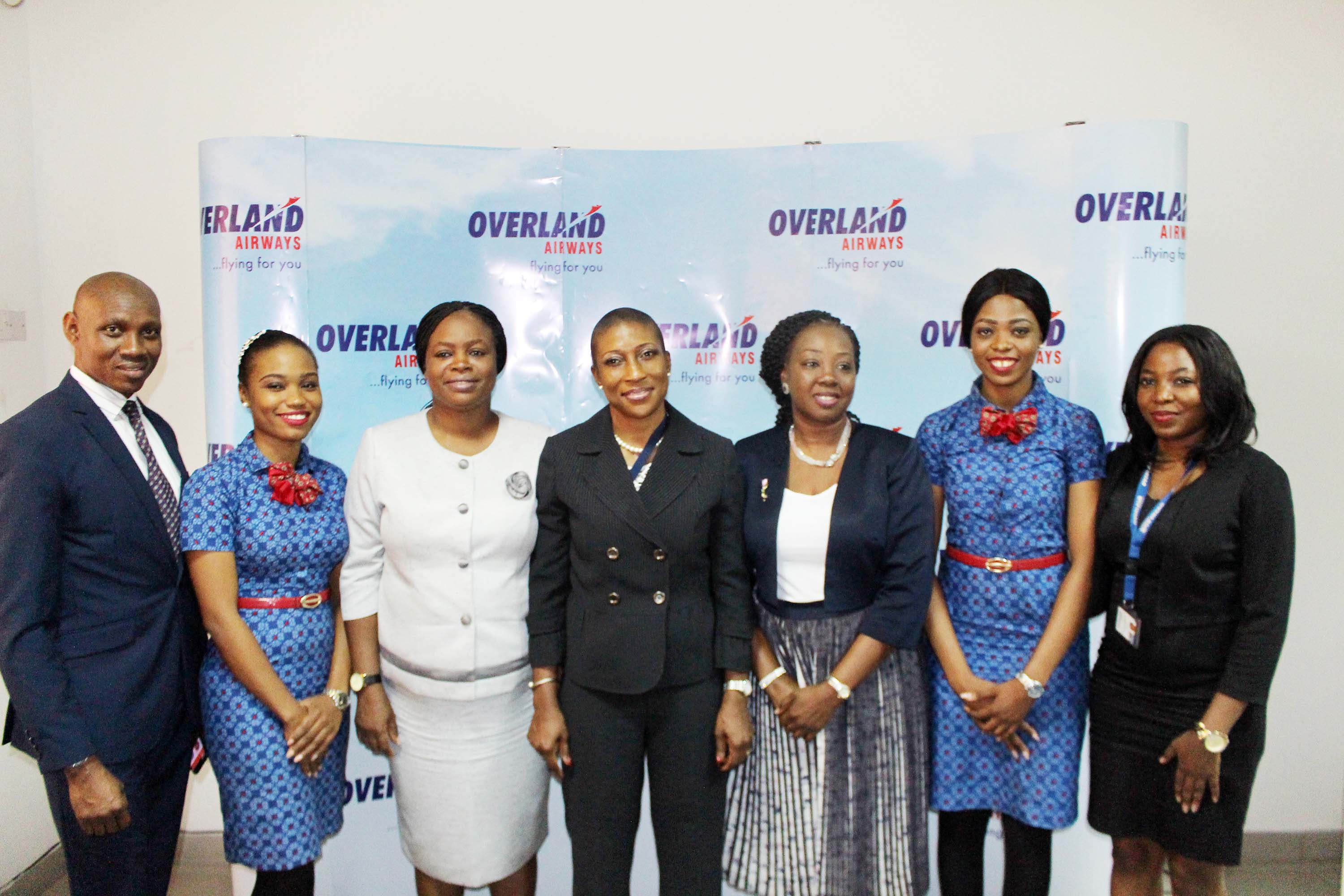 L-R: Mr. Roland Ohaeri, Head, Corporate Communications; Ms. OreOluwa Adegunwa, Cabin Safety Officer; Mrs. Aderonke Emmanuel-James, Manager, Corporate Services; Mrs. Aanu Benson, Chief Operating Officer; Mrs. Aduke Atiba, Executive Director; Ms. Grace Asojo, Cabin Safety Officer; Ms. Yvonne Morfaw, Network Development Supervisor, all of Overland Airways Limited at the media conference on the launch of the airline’s flights to Cotonou, Republic of Benin and Lome, Republic of Togo