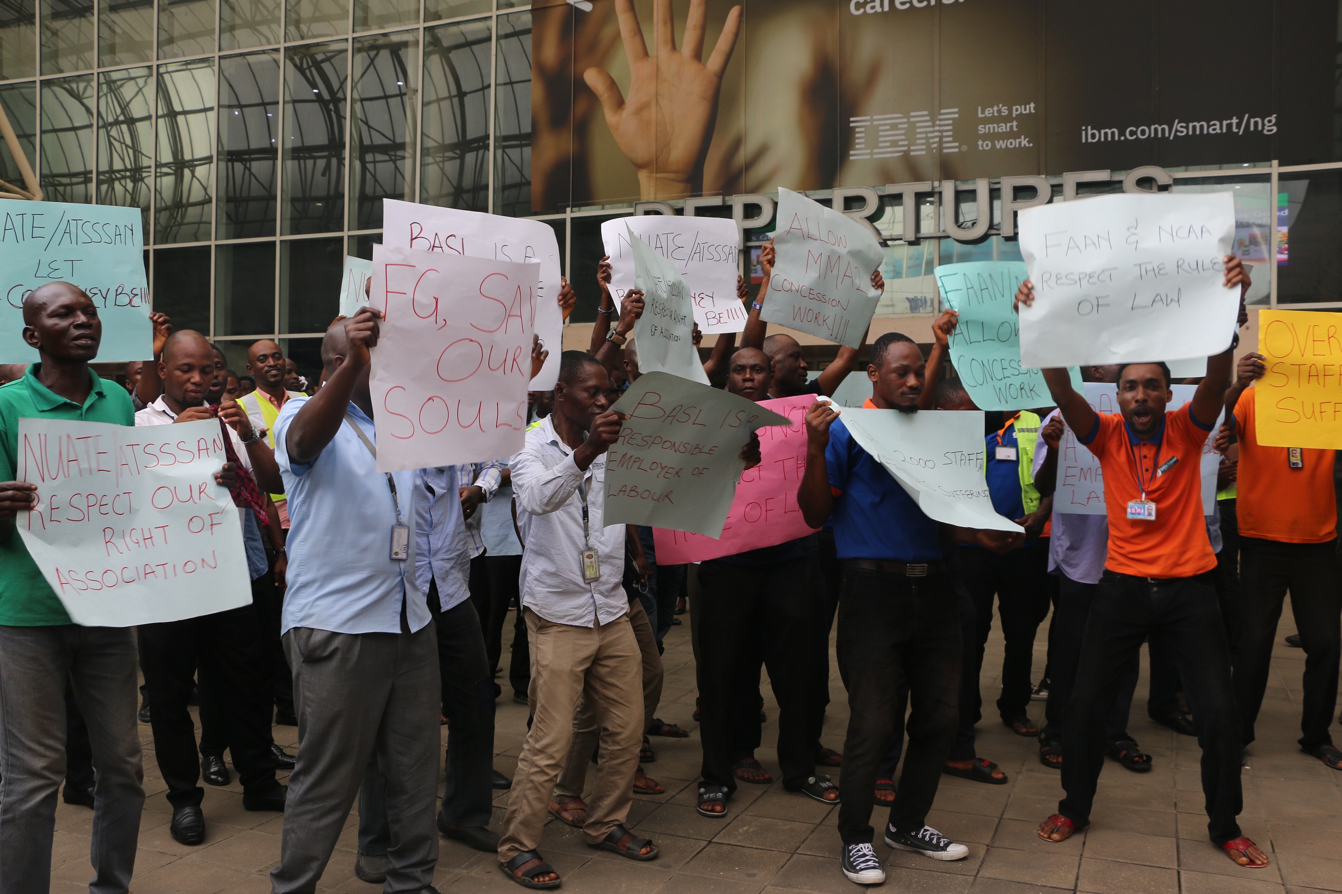 Concessionaires, business owners and workers of the Murtala Muhammed Airport Terminal Two (MMA2), operated by Bi-Courtney Aviation Services Limited (BASL), protesting the plans of aviation unions to invade and destroy facilities at the terminal yesterday.