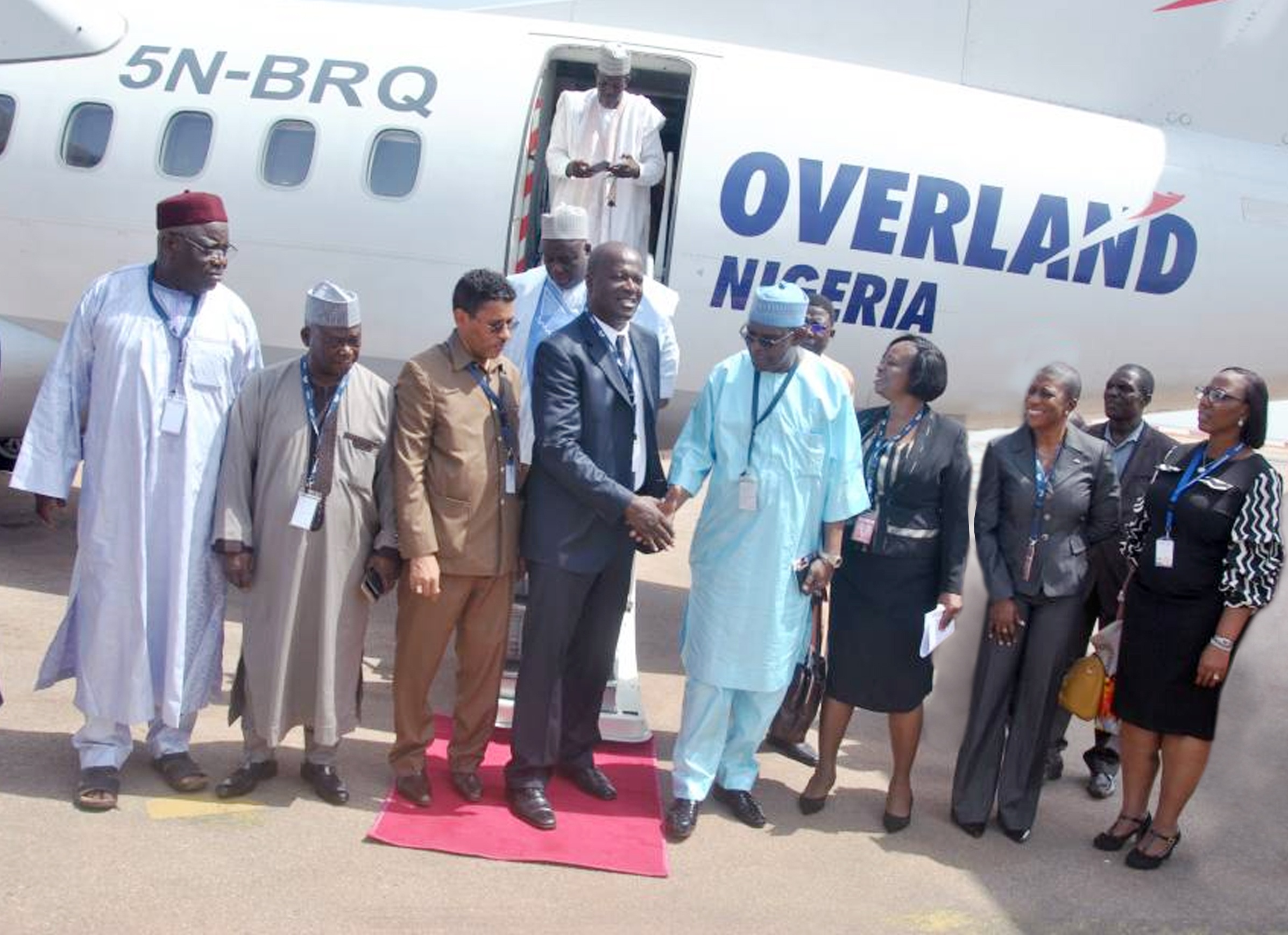 Hon. Dr. Mahamadou Karidjo, Minister of Transport, Niger Republic (fifth from left) welcoming Capt. Edward Boyo, MD, Overland Airways (fourth from left) during the launch ceremony of Overland Airways’ Lagos-Cotonou-Niamey flight in Niamey, Niger Republic in the presence of Alh. Ahmed Ayaha, DG, ANAC, Niger Republic (third from left); Mr. John Usman representing H.E. Amb. Attahiru Haliru, Ambassador of Nigeria to Niger Republic (second from left) and other officials from the aviation, business and diplomatic communities