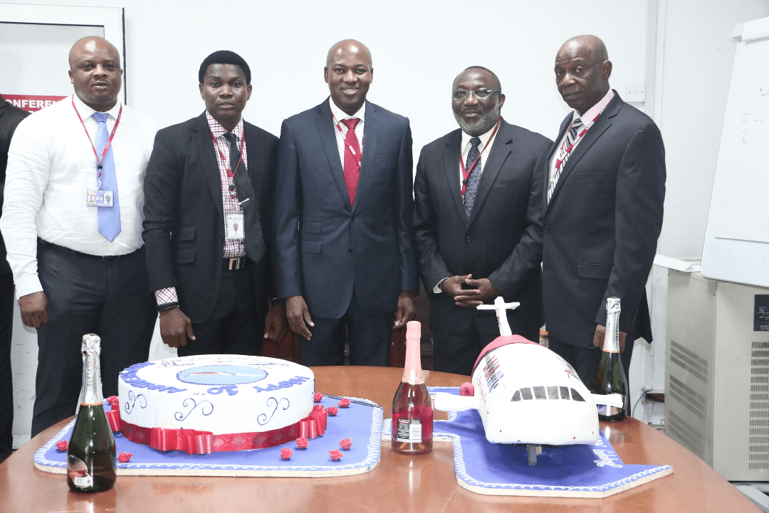 L-R Cabin Services Manager of Dana Air, Innocent Udoh, Media and Communications Manager of Dana Air, Kingsley Ezenwa, Chief Operating officer of Dana Air, Obi Mbanuzuo, Director of Flight Operations, Captain Segun Omole and Flight Operations and Quality Assurance Manager, Captain Kayode Ola during Dana Air's 10th anniversary cake cutting event in Lagos recently