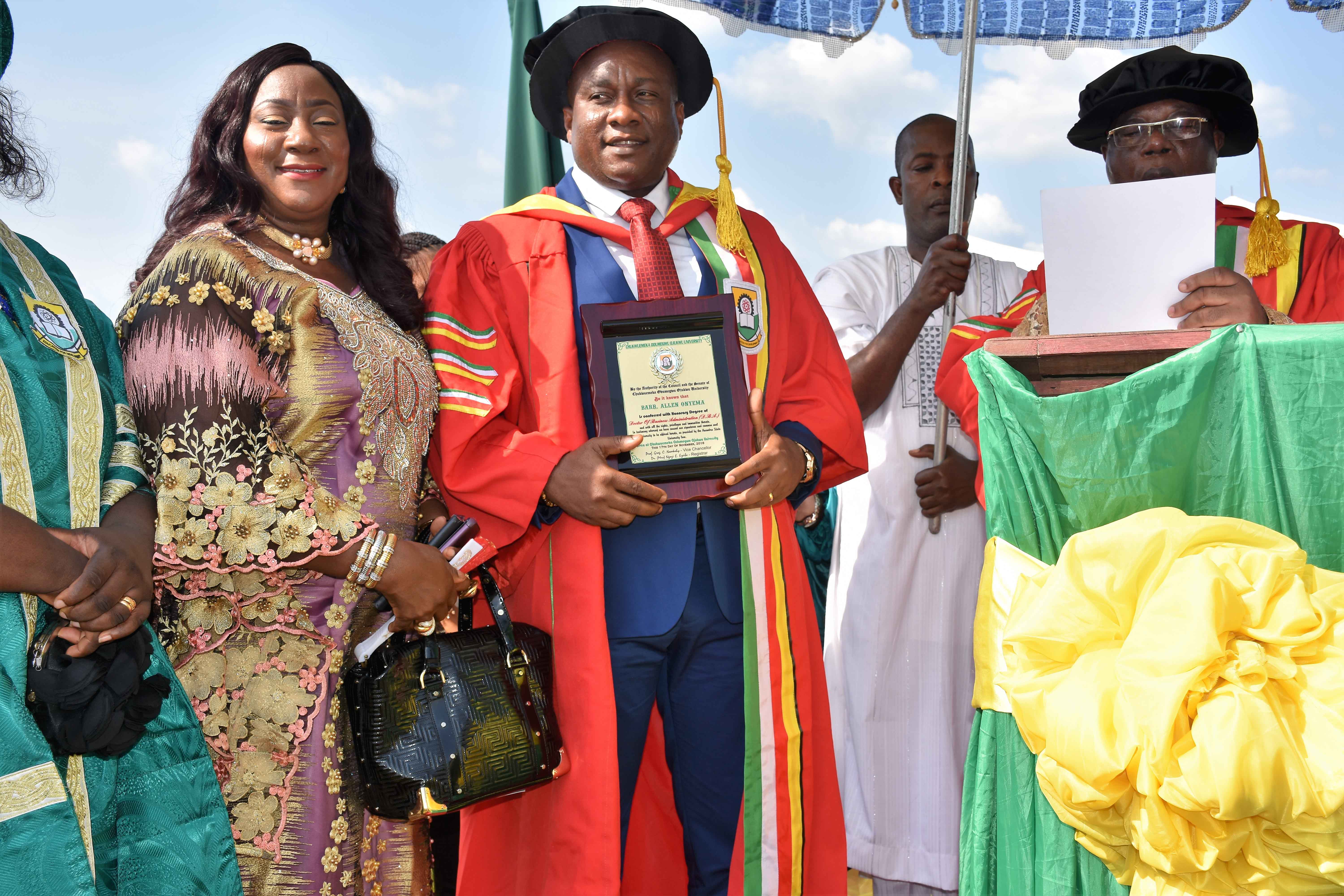 Air Peace Chairman/Chief Executive Officer, Mr. Allen Onyema flanked by the Vice Chairman, Mrs. Alice Onyema and Chancellor of Chukwuemeka Odumegwu Ojukwu University and Ewi of Ado Ekiti, HRM Oba (Dr) Rufus Adeyemo Adejugbe Aladesanmi III (right) during the conferment of an honourary Doctor of Business Administration of Chukwuemeka Odumegwu Ojukwu University on Onyema on Saturday.