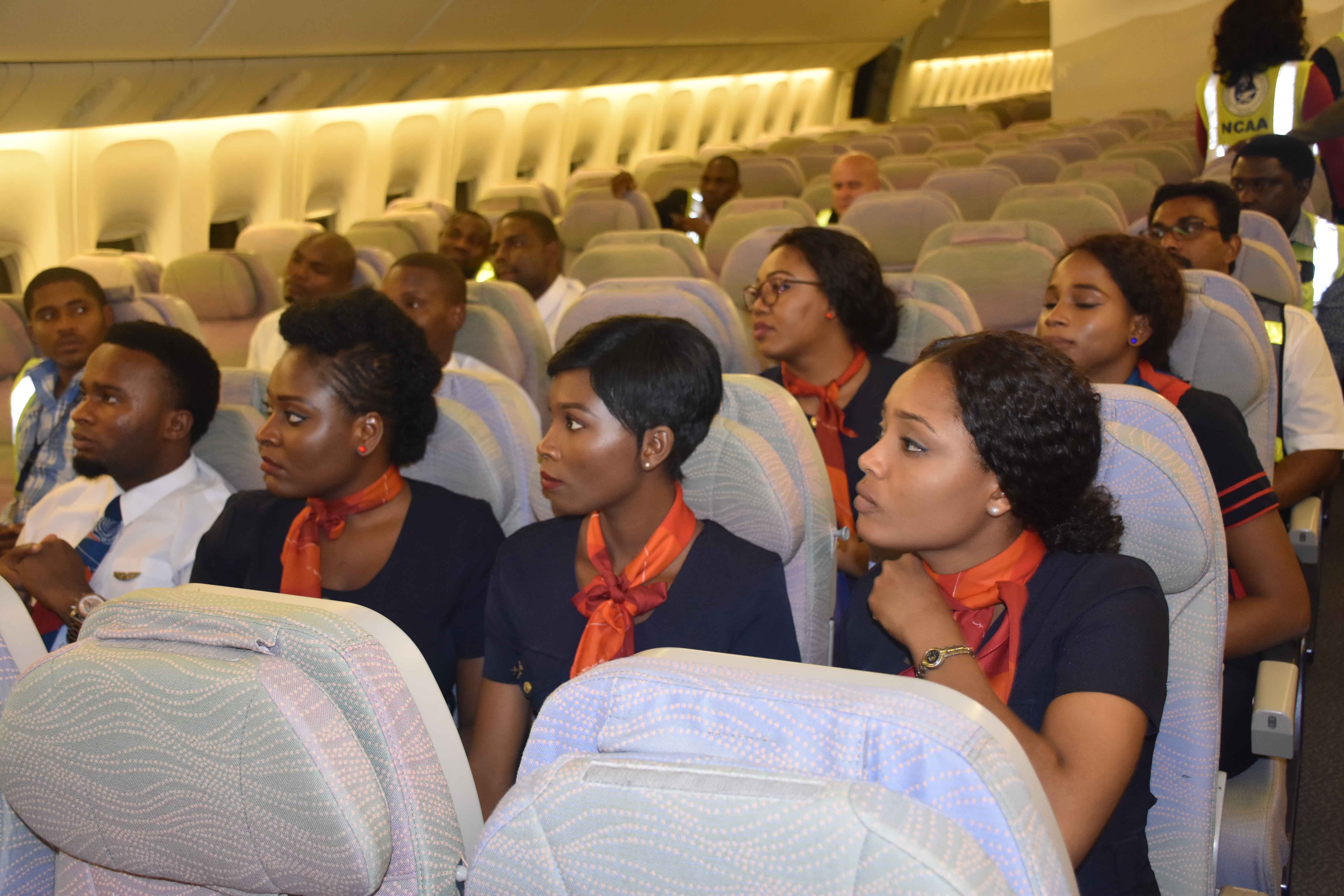 Leader of the Nigerian Civil Aviation Authority inspectors, Group Capt. E. C. Agu (right) and his colleagues during Air Peace’s emergency evacuation and ditching demonstrations at the Murtala Muhammed International Airport, Lagos on Thursday