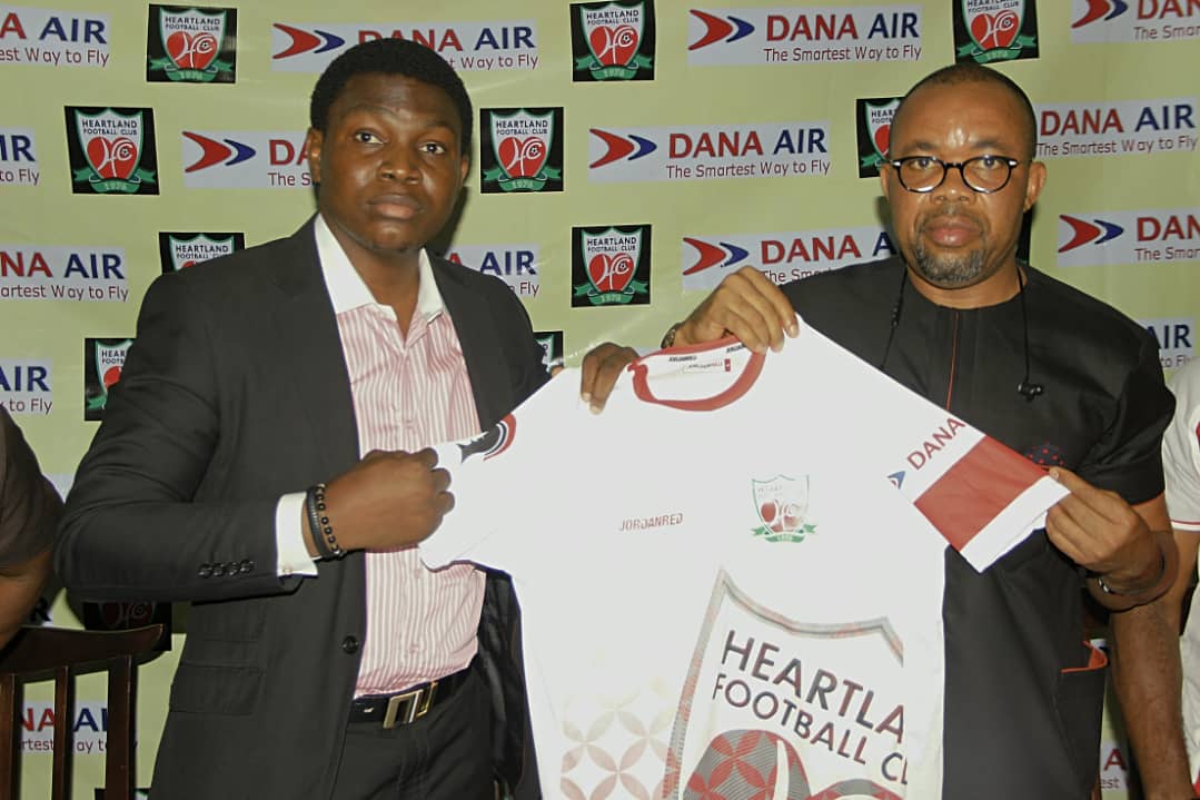 Caption for pics WA0025 - (L-R) Media and Communications Manager of Dana Air, Kingsley Ezenwa and President of Heartland Football Club of Owerri, Chief Goodfaith Etuemena, during the contract extension signing of Dana Air's sponsorship of the club for another one year recently in Owerri.