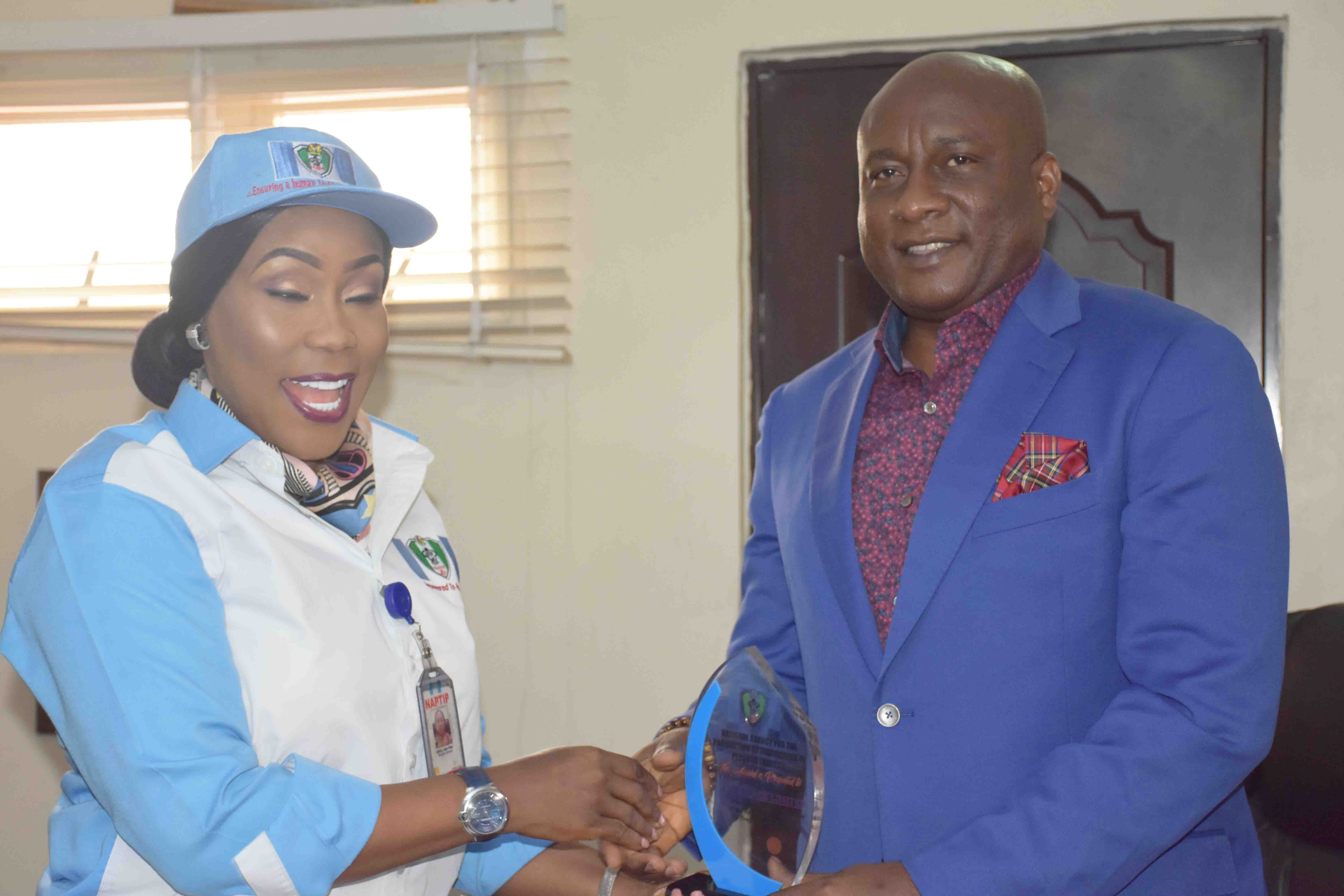 Air Peace Chairman/Chief Executive Officer, Mr. Allen Onyema receiving an award from the Director General of the National Agency for the Prohibition of Trafficking in Persons (NAPTIP), Dame Julie Okah-Donli at the carrier’s corporate headquartersin Lagos on Thursday in recognition of the airline’s effort in checking human trafficking.