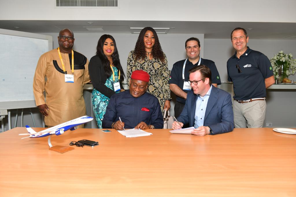 AIR PEACE INKS DEAL FOR ACQUISITION OF 30 NEW AIRRCAFT L-R: (Standing) Air Peace Embraer Engineer, Mr. Charles Melomney, Chief Operating Officer, Mrs. Oluwatoyin Olajide, Chief of Finance and Administration, Mrs. Ejiro Eghagha, Embraer VP Sales and Marketing, Middle East and Africa, Mr. Raul Villaron and Sales Director, Africa, Francisco Moraes. (sitting) Chairman/CEO, Air Peace, Allen Onyema and Embraer Chief Commercial Officer, Mr. Arjan Meijer during the signing of a contract for 30 brand new Embaer 195-E2 aircraft between Air Peace and Embraer at Embraer Business Meeting with the Aviation World in Port Louis, Mauritius yesterday.